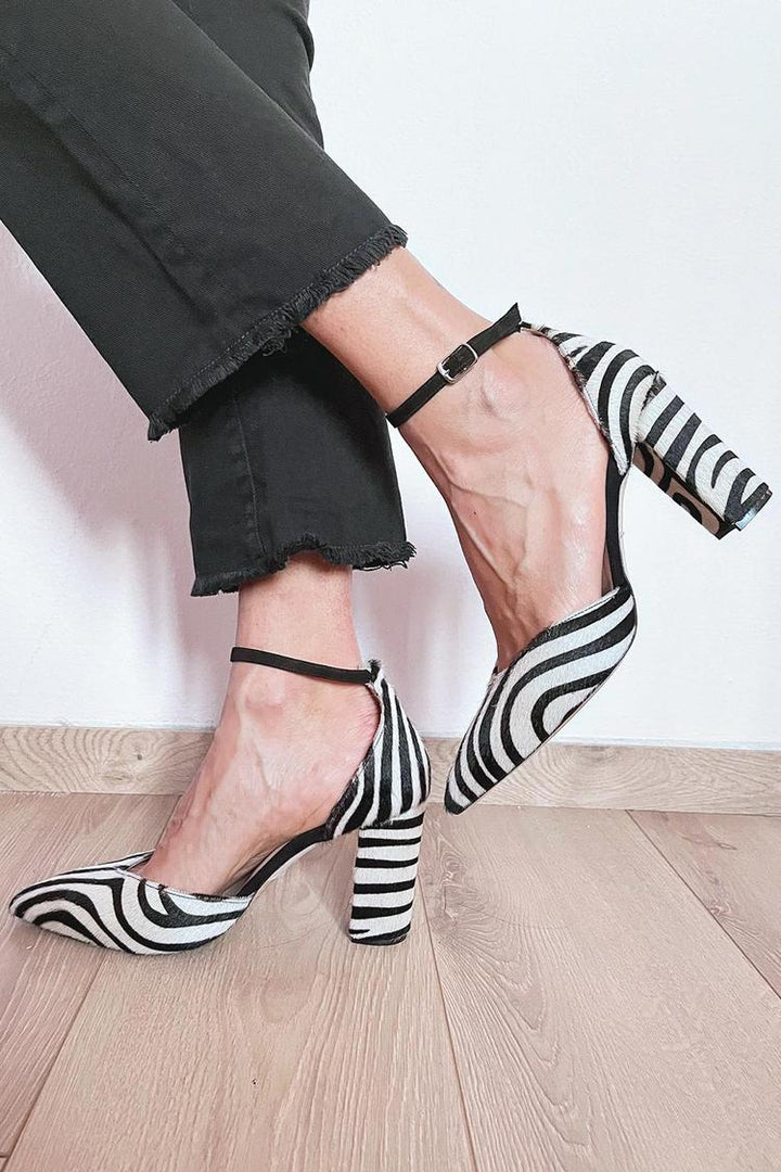 Zebra print pumps with ankle strap